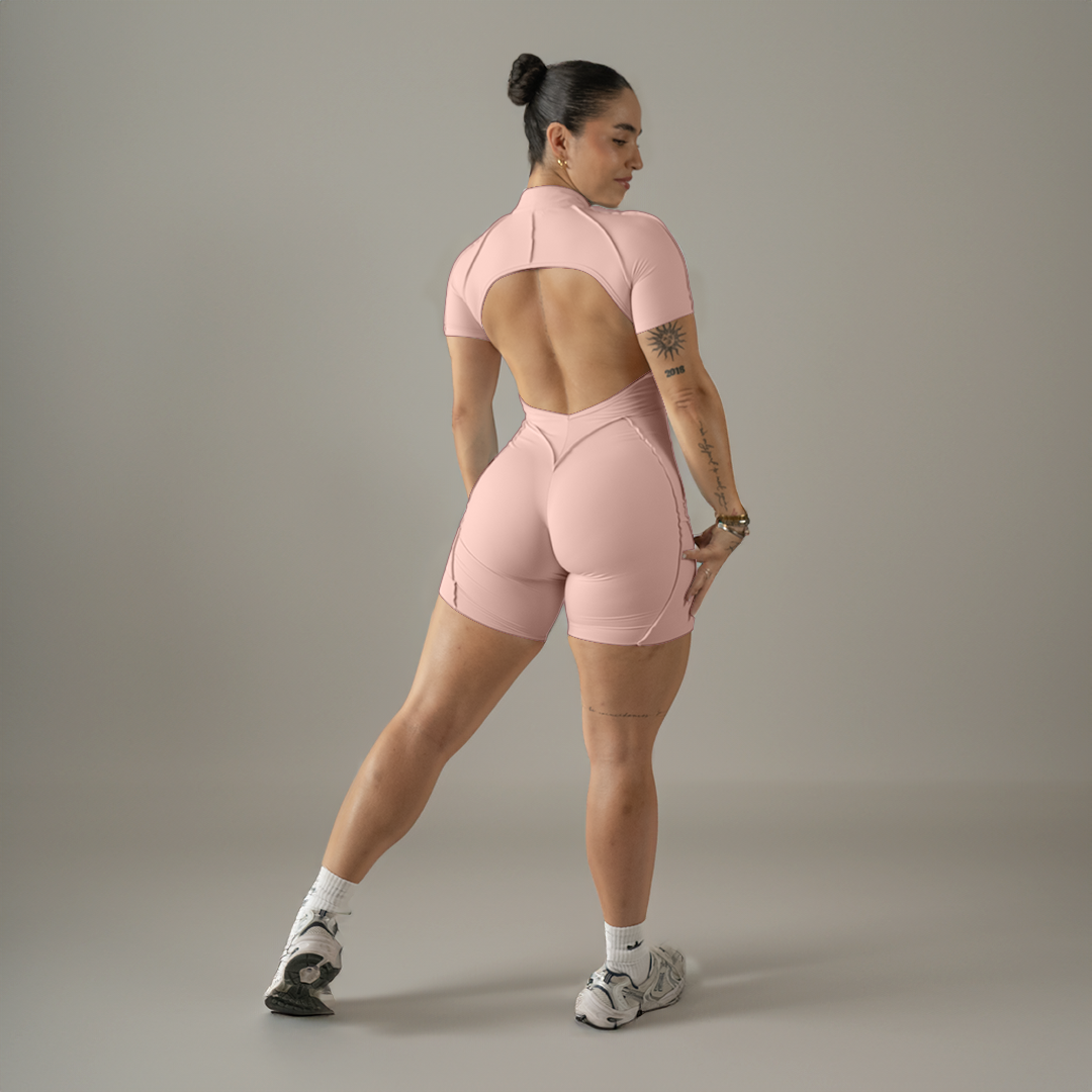 Jumpsuit depotivo en short con espalda escotada rosa