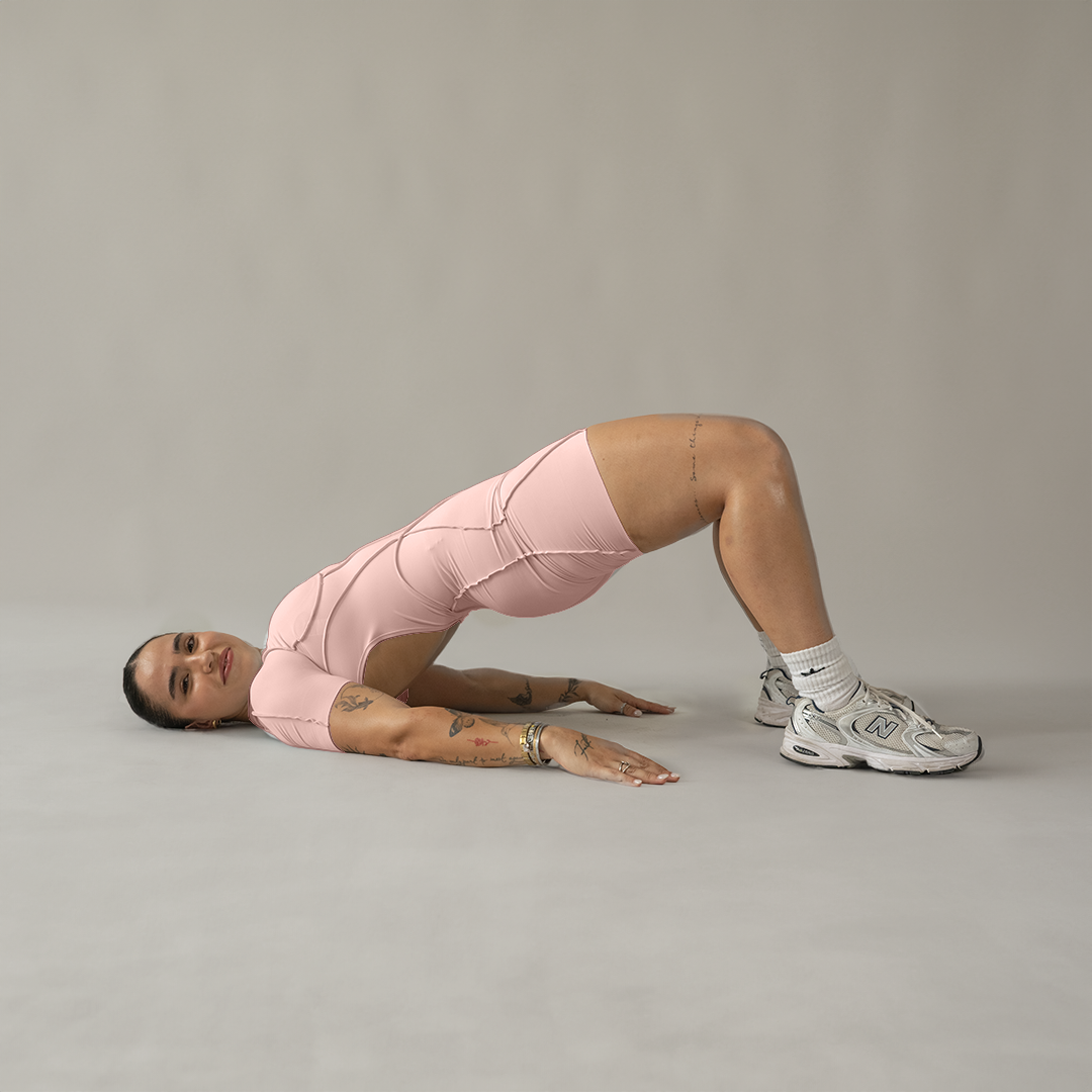 Jumpsuit depotivo en short con espalda escotada rosa