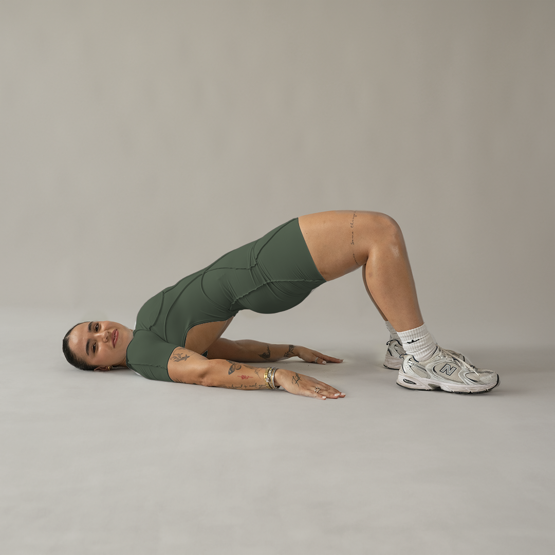 Jumpsuit depotivo en short con espalda escotada verde